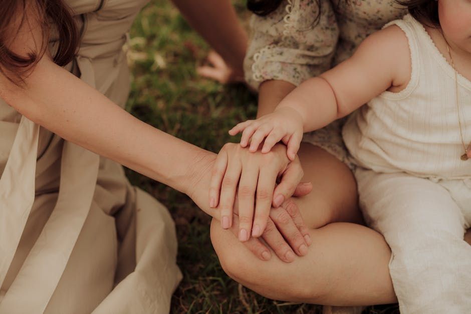 Family members talking together, hands held