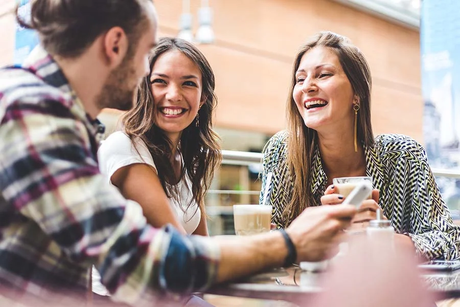 an alumni group meets for coffee and catching up