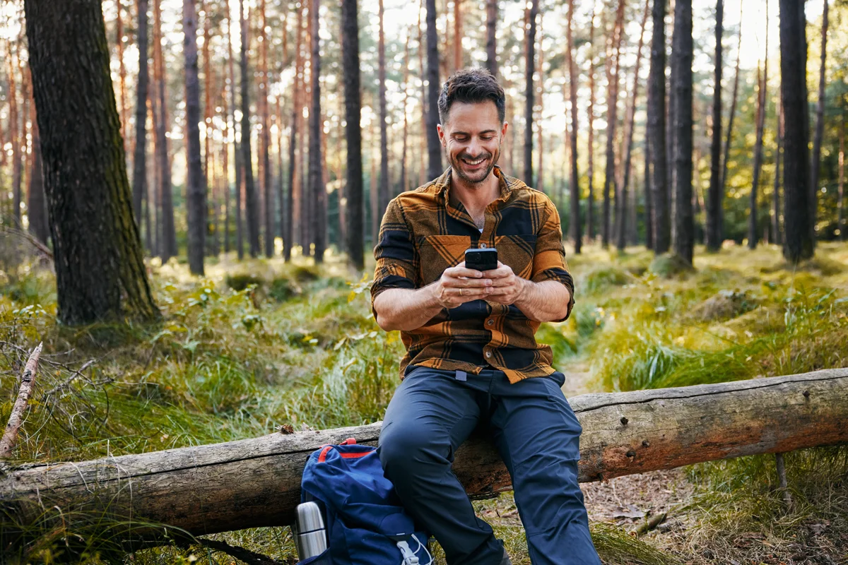 Man sitting on log